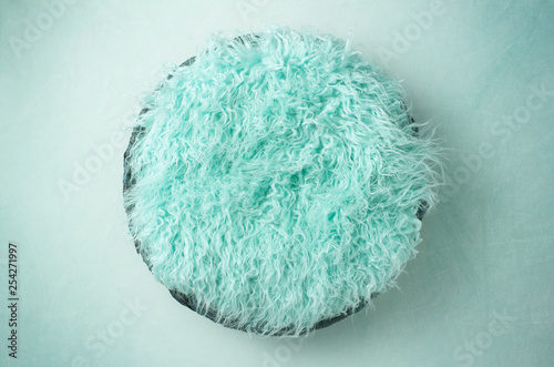Teal Fur in a Basket Newborn Backdrop for Photographers photo
