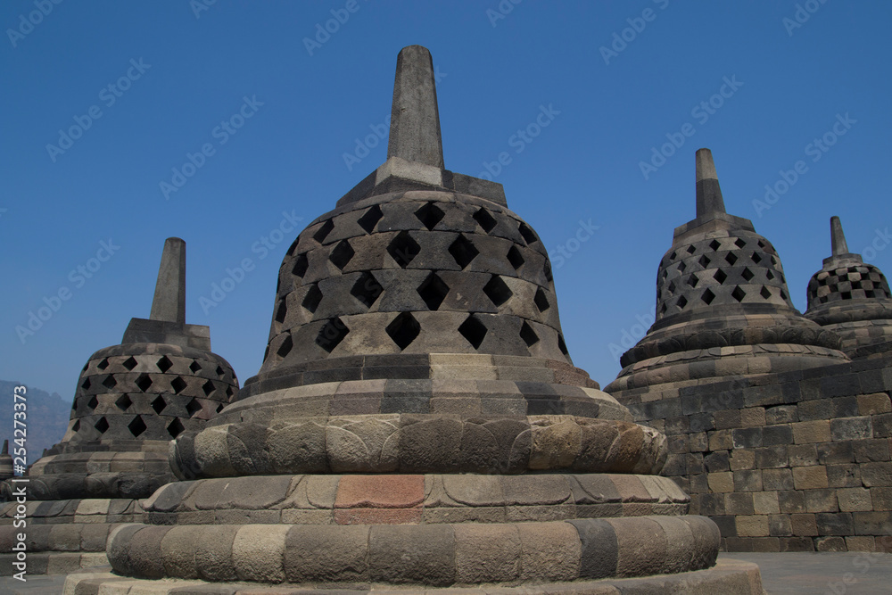 Stoepa of the borobudur temple.The 9th-century Mahayana Buddhist temple Borobudur, Magelang Regency, near Yogyakarta, Java Island, Indonesia. Stoepa of the borobudur temple.The 9th-century Mahayana Buddhist temple Borobudur, Magelang Regency, near Yogyakarta, Java Island, Indonesia.