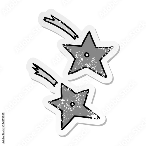 distressed sticker cartoon doodle of ninja throwing stars