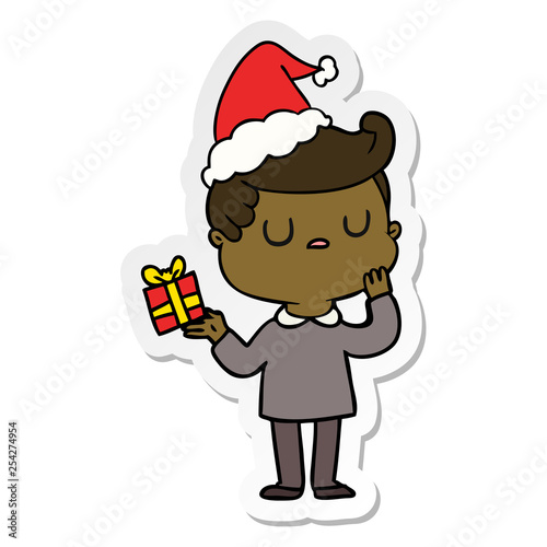 sticker cartoon of a man wondering wearing santa hat