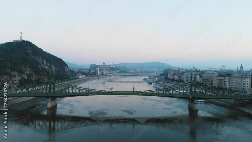 Aerial view of Liberty bridge on river Danube in Budapest at sunrise, morning, forward movement Aerial view of Liberty bridge on river Danube in Budapest at sunrise, morning, forward movement