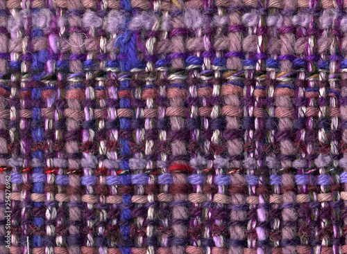 Handwoven woolen fabric in purple tones
