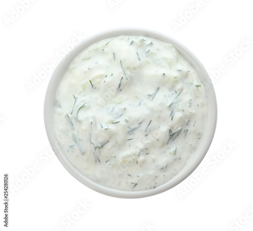 Photography Bowl with cucumber sauce on white background, top view