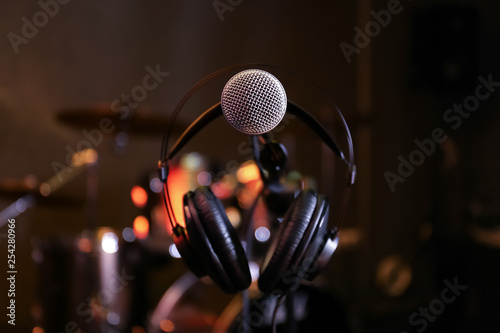 Condenser microphone and headset in modern recording studio © New Africa
