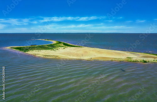 Aerial view of the dunes island "Las Dunas de San Cosme y Damian" in the middle of the Rio Parana near the city Encarnacion in Paraguay.