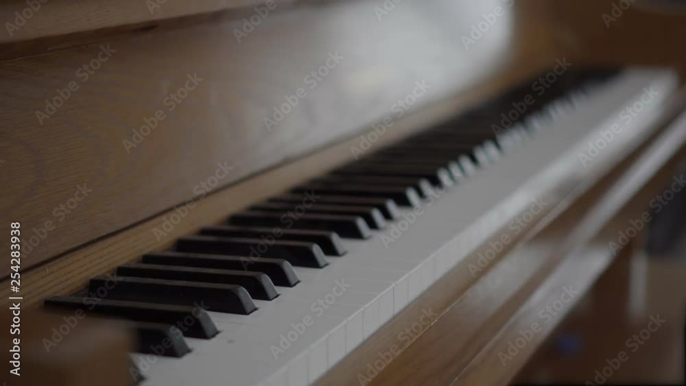 moving bokeh on a piano keyboard moving bokeh on a piano keyboard