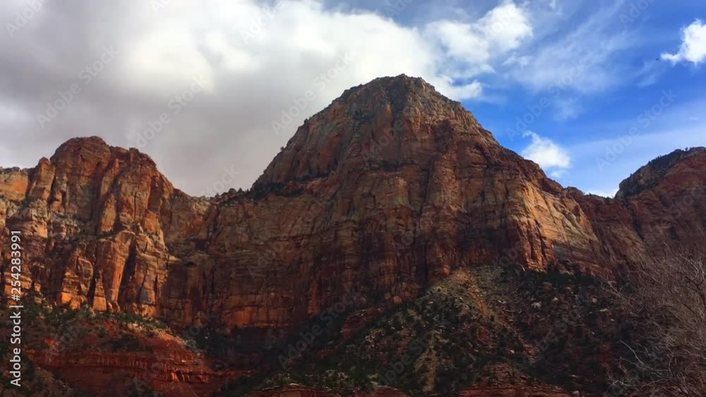 A shot of a few mountains in Dixie Canyon with the clouds passing. A shot of a few mountains in Dixie Canyon with the clouds passing.