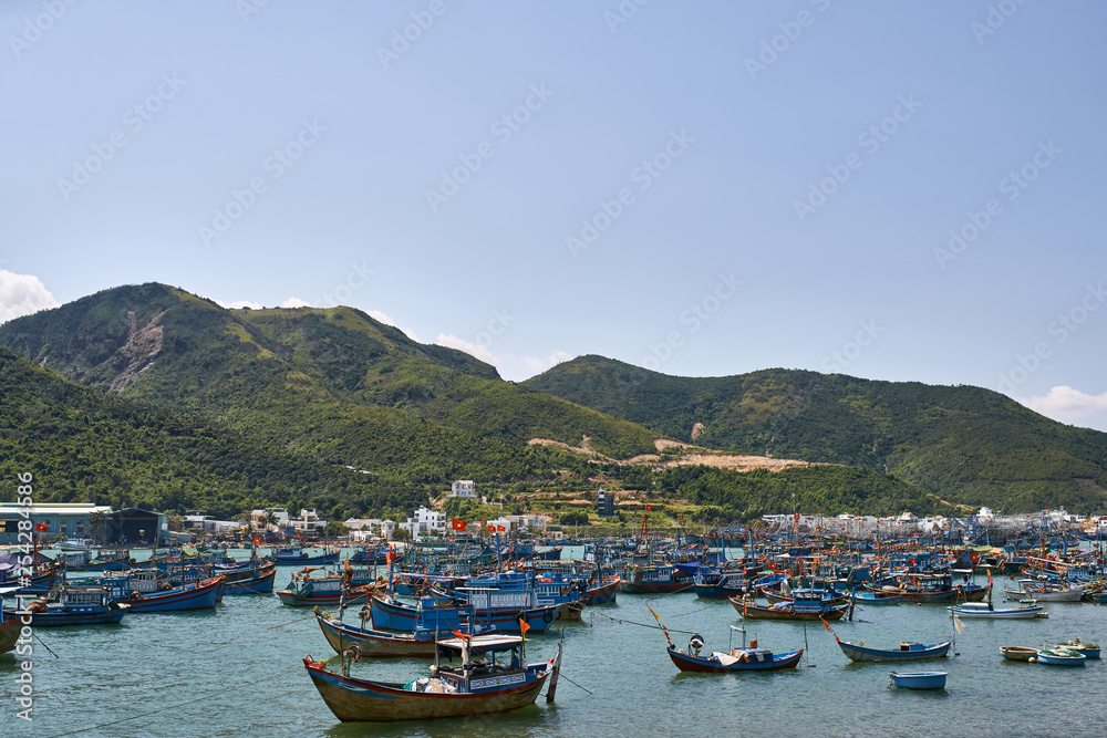 Beautiful landscape of sea bay with many fishing boats in Vietnam
