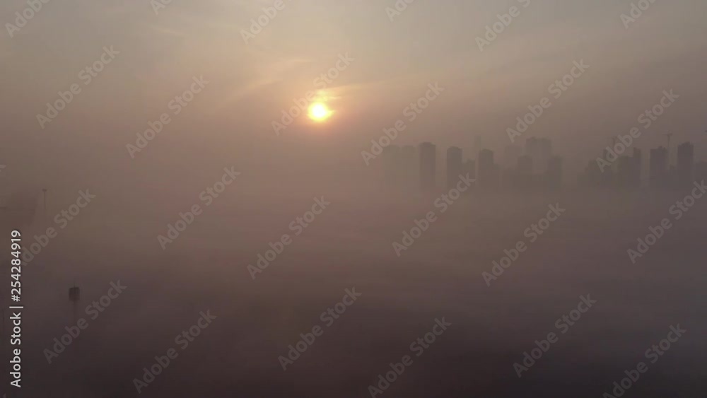 A new town in the haze where the sun rises. A new town in the haze where the sun rises.