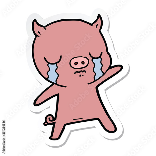 sticker of a cartoon pig crying