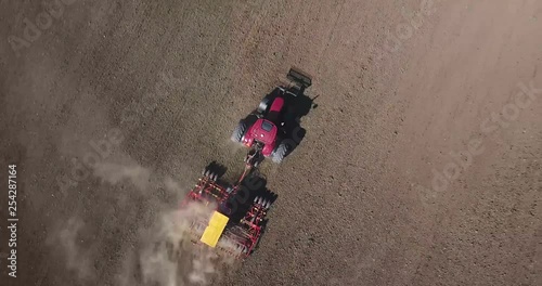 4k Aerial footage of Tractor - Sweden photo