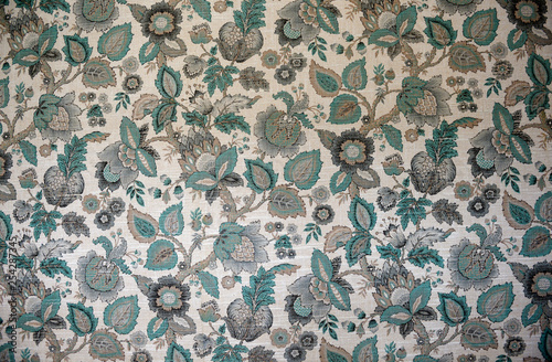 Kitsch textile. Vintage floral pattern wallpaper tapestry.
