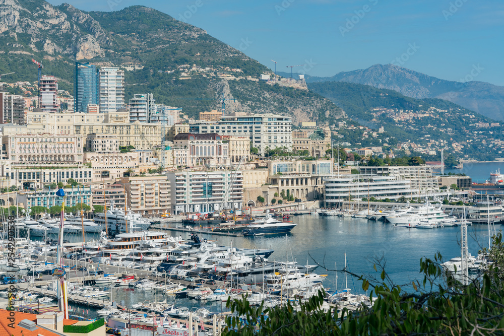 Aerial view of the Monaco cityscape with many ships