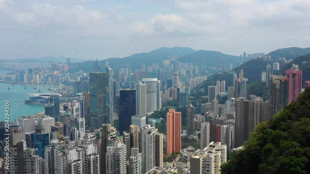 sunny day hong kong cityscape downtown victoria harbour hill aerial panorama 4k sunny day hong kong cityscape downtown victoria harbour hill aerial panorama 4k