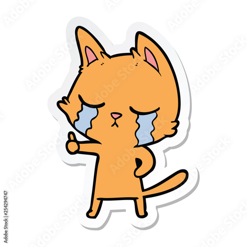 sticker of a crying cartoon cat