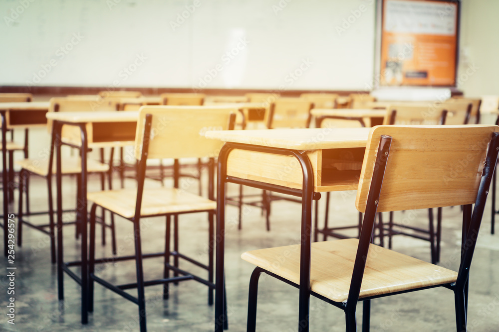 School empty classroom, Lecture room with desks and chairs iron wood for studying lessons in highschool thailand without young student, interior of secondary education with whiteboard