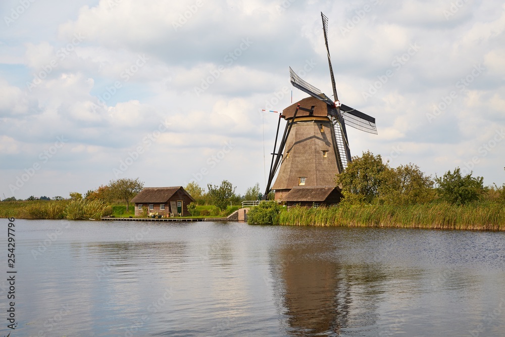 Windmill beside a canal