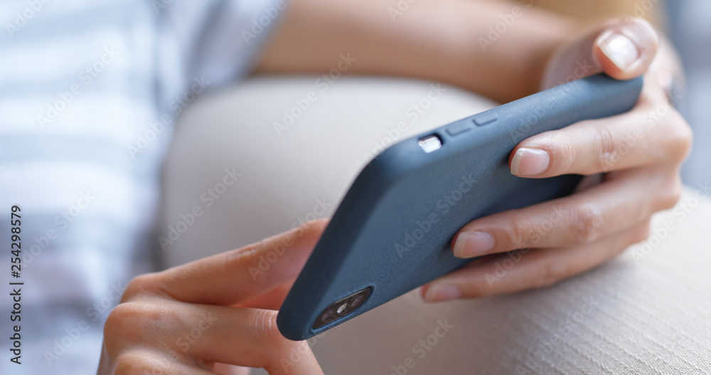 Close up of woman use of mobile phone