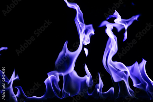 burning blue fire flame on the black background