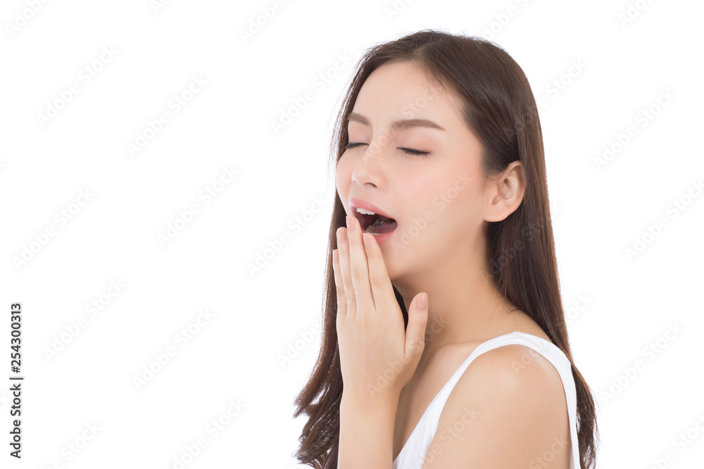 Beautiful portrait young asian woman yawn want resting with sleepy isolated on white background, girl wake up with tired and bored in morning, lifestyle and relax concept. Beautiful portrait young asian woman yawn want resting with sleepy isolated on white background, girl wake up with tired and bored in morning, lifestyle and relax concept.
