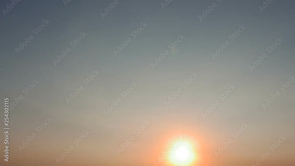 Sun rising, early morning time-lapse with clear sky and copy space Sun rising, early morning time-lapse with clear sky and copy space