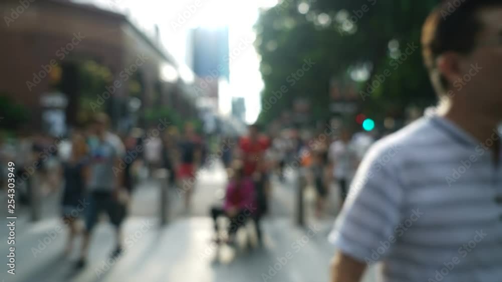 Time lapse of blurred pedestrians, on a busy day Time lapse of blurred pedestrians, on a busy day