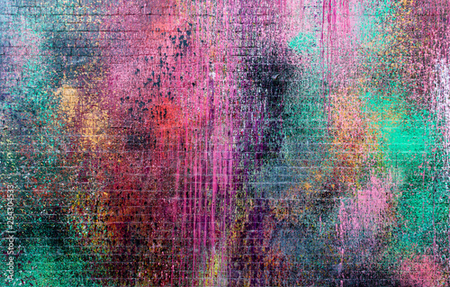 Brick wall painted with vibrant colors