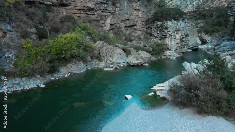 Low aerial shot with drone fly between walls of river canyon Low aerial shot with drone fly between walls of river canyon