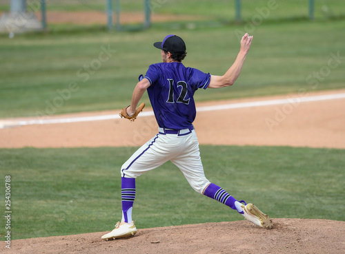 Photography Young athletic boys playing baseball