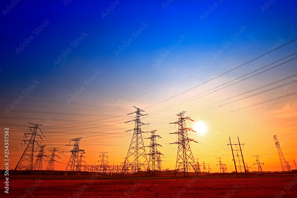 Electric tower, silhouette at sunset