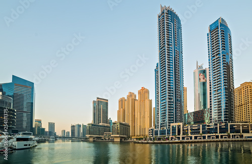 Dubai marina towers  boats and skyscrapers