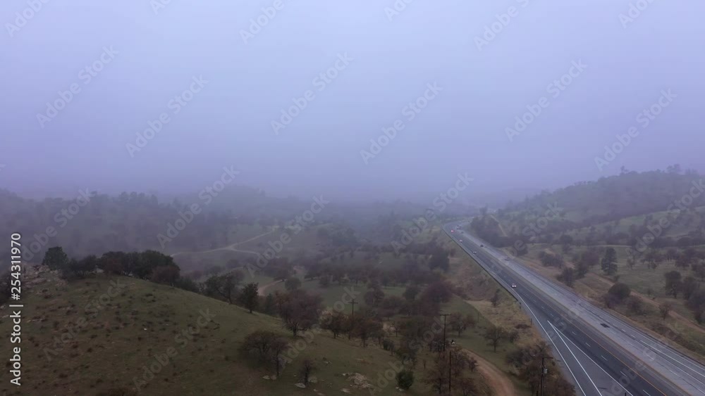Aerial Fly Over of Highway in California Mountains on Foggy Winter Morning Aerial Fly Over of Highway in California Mountains on Foggy Winter Morning