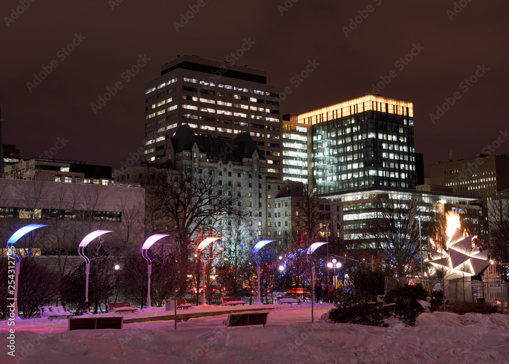 Marion Dewar Plaza Ottawa City Hall at night in winter with Canada 150th birthday cauldron flame Marion Dewar Plaza Ottawa City Hall at night in winter with Canada 150th birthday cauldron flame