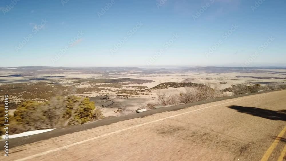 A drive down a windy mountain road with amazing views in New Mexico A drive down a windy mountain road with amazing views in New Mexico