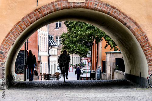 UPPSALA, SWEDEN A woman bikes through a vault in downtown. photo
