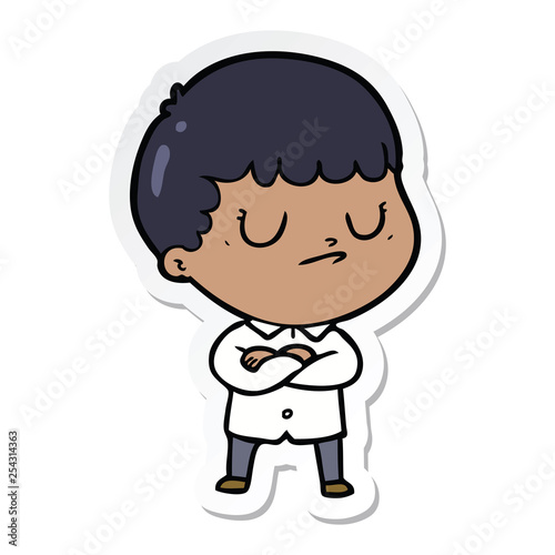 sticker of a cartoon grumpy boy