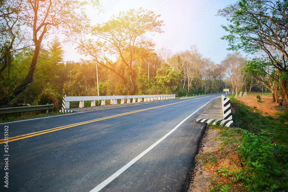 Asphalt road and concrete bridge at countryside in summer Asphalt road and concrete bridge at countryside in summer