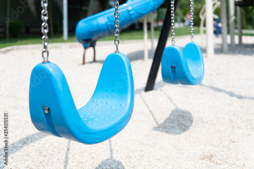 Empty Swings on the Children's Playground