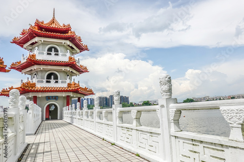 Photography The Twin Pagodas on Jurong Lake, in the Chinese Garden with  cloudy sky in Singapore