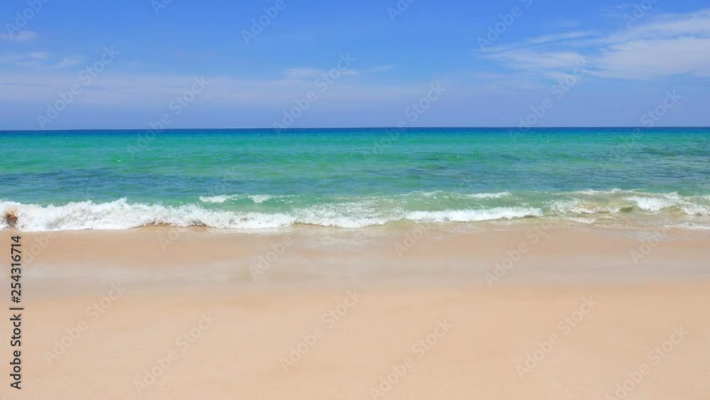 Textured blue water waves hitting the shoreline sandy beach in Bangkok Textured blue water waves hitting the shoreline sandy beach in Bangkok