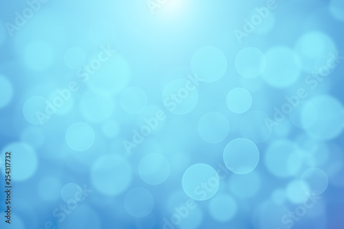 Blue blurred soft lights bokeh textured abstract background, light blue bokeh texture for backdrop or background © ezstudiophoto