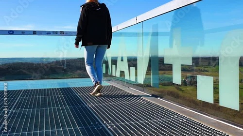 girl walking on the top deck of a Viewing Plattform photo