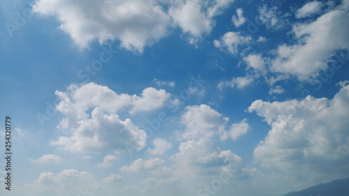 Fototapeta Naklejka Na Ścianę i Meble -  fluffy white cloud on clear blue sky