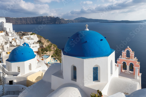 Blue and white domed churches on Santorini Greek Island, Oia town, Santorini, Greece.