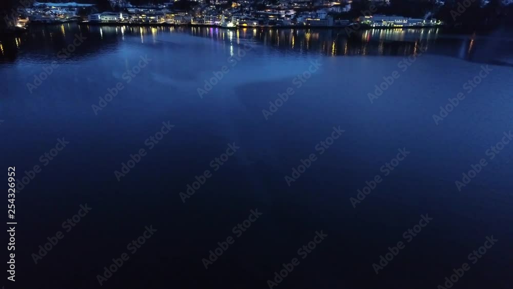 4k drone of Norwegian fjords and Stranda city at night. 4k drone of Norwegian fjords and Stranda city at night.