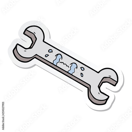 sticker of a cartoon crying spanner