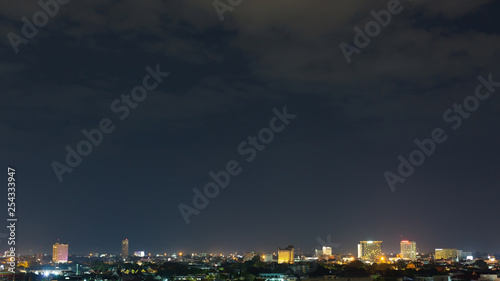 landscape city night with dramatic moody dark sky