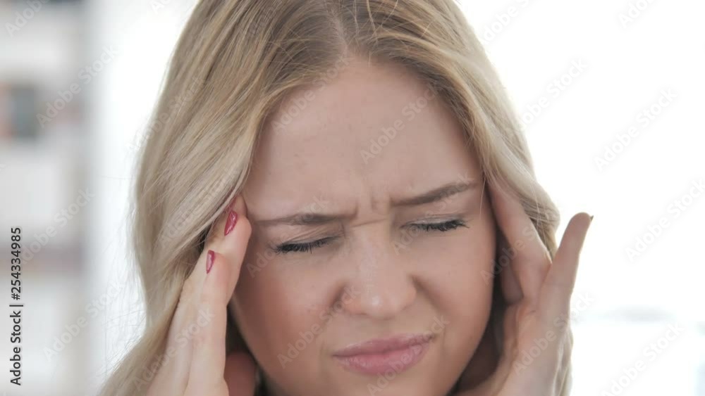 Close Up of Woman with Headache and Stress Close Up of Woman with Headache and Stress