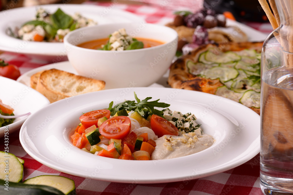 Table served with different food 