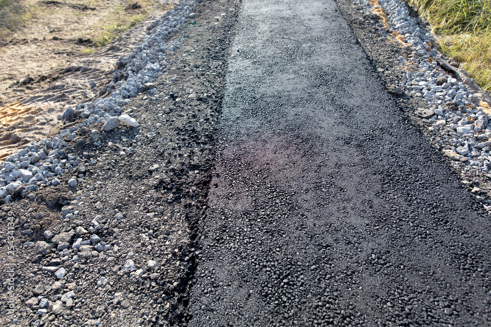 New asphalt on a pedestrian road as a background New asphalt on a pedestrian road as a background